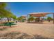 Playground with picnic tables and shaded areas at 4809 E Fire Opal Ln, San Tan Valley, AZ 85143