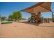 Shaded playground with a large play structure at 4809 E Fire Opal Ln, San Tan Valley, AZ 85143