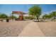 Playground with shaded areas and nearby basketball court at 4809 E Fire Opal Ln, San Tan Valley, AZ 85143