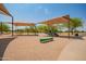 Playground with shaded areas and multiple play structures at 4809 E Fire Opal Ln, San Tan Valley, AZ 85143