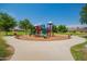 Community playground with playset and benches at 4809 E Fire Opal Ln, San Tan Valley, AZ 85143