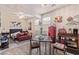 Small bedroom with a kitchenette and a red couch at 4809 E Fire Opal Ln, San Tan Valley, AZ 85143
