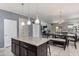 Open concept kitchen with island and granite countertops at 4809 E Fire Opal Ln, San Tan Valley, AZ 85143