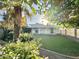 Landscaped backyard with lush greenery and a charming casita at 4423 E Ponca St, Phoenix, AZ 85044