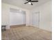 Bedroom with carpet flooring and access to another room at 19031 W Palo Verde Dr, Litchfield Park, AZ 85340
