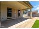 Covered patio with sliding glass doors and view of backyard at 19031 W Palo Verde Dr, Litchfield Park, AZ 85340
