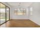 Bright dining area with hardwood floors and chandelier at 19031 W Palo Verde Dr, Litchfield Park, AZ 85340