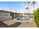 Inviting backyard oasis featuring a sparkling pool and patio at 6639 E Sharon Dr, Scottsdale, AZ 85254