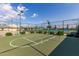 Community basketball court with tennis courts nearby at 10908 E Olla Ave, Mesa, AZ 85212