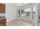 Kitchen nook with tile flooring and a view of the backyard at 10908 E Olla Ave, Mesa, AZ 85212