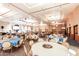 Banquet hall with tables set for a large event at 41650 W Harvest Moon Dr, Maricopa, AZ 85138
