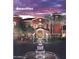 Amenity building at Province with a fountain and palm trees at 41650 W Harvest Moon Dr, Maricopa, AZ 85138