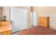 Well-lit bedroom with a double bed and built-in closet at 6786 W Gelding Ln, Coolidge, AZ 85128