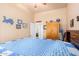 Spacious bedroom with a double bed and ample closet space at 6786 W Gelding Ln, Coolidge, AZ 85128