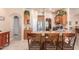Modern kitchen with granite countertops and wood cabinets at 6786 W Gelding Ln, Coolidge, AZ 85128