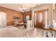 Cozy living room with a sofa, TV, and decorative wall art at 6786 W Gelding Ln, Coolidge, AZ 85128