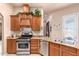 Kitchen with stainless steel appliances and granite countertops at 6786 W Gelding Ln, Coolidge, AZ 85128