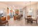 Kitchen with stainless steel appliances and an island with seating at 6786 W Gelding Ln, Coolidge, AZ 85128