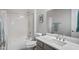 Clean bathroom with a bathtub, toilet and vanity at 41650 W Harvest Moon Dr, Maricopa, AZ 85138
