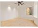Bright bedroom with tile flooring and a window offering natural light at 31811 N 16Th Ave, Phoenix, AZ 85085
