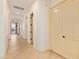 Bright hallway with tile floors and neutral walls at 31811 N 16Th Ave, Phoenix, AZ 85085