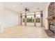Living room with hardwood floors, fireplace, and large windows at 31811 N 16Th Ave, Phoenix, AZ 85085