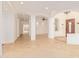 Spacious living room with tile flooring and access to other rooms at 31811 N 16Th Ave, Phoenix, AZ 85085