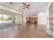 Open living space with hardwood floors, kitchen views and fireplace at 31811 N 16Th Ave, Phoenix, AZ 85085