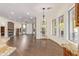 Bright living room features hardwood floors, fireplace, and large windows at 31811 N 16Th Ave, Phoenix, AZ 85085