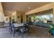 Covered patio with large sliding doors leading to the backyard at 31811 N 16Th Ave, Phoenix, AZ 85085
