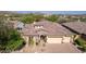 Single-story home with tile roof and desert landscaping at 31811 N 16Th Ave, Phoenix, AZ 85085
