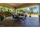Outdoor patio with dining set and built-in grill at 31811 N 16Th Ave, Phoenix, AZ 85085