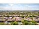 Wide aerial view of houses, landscape, and distant mountains at 31811 N 16Th Ave, Phoenix, AZ 85085