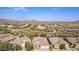 Community overview showcasing various houses and landscape at 31811 N 16Th Ave, Phoenix, AZ 85085
