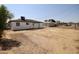 Back of house view, large dirt backyard at 5001 S 20Th Pl, Phoenix, AZ 85040