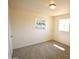 Bright bedroom with new carpet and neutral walls at 5001 S 20Th Pl, Phoenix, AZ 85040