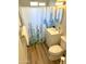Bathroom with a cactus shower curtain and white vanity at 2057 E Howe Ave, Tempe, AZ 85281