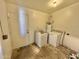 Laundry room with washer, dryer, and exterior access at 2057 E Howe Ave, Tempe, AZ 85281