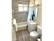 Clean bathroom with tub, shower, and white vanity at 2057 E Howe Ave, Tempe, AZ 85281
