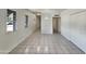 Clean hallway with tiled floors and access to rooms at 2326 N 48Th Dr, Phoenix, AZ 85035