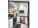 Modern kitchen with white cabinetry and stainless steel appliances at 7101 W Beardsley Rd # 452, Glendale, AZ 85308