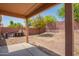 Covered patio overlooks a desert landscape backyard at 23780 W Tonto St, Buckeye, AZ 85326