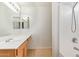 Bathroom with double vanity, tiled floor, and bathtub at 23780 W Tonto St, Buckeye, AZ 85326