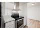 Modern kitchen with white cabinets and stainless steel appliances at 4015 S 45Th St, Phoenix, AZ 85040