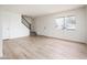 Spacious living area with light floors and stairs at 4015 S 45Th St, Phoenix, AZ 85040
