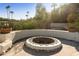 Outdoor fire pit area with seating and desert landscaping at 4754 E Valley Vista Ln, Paradise Valley, AZ 85253