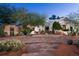 Exterior view showcasing the unique architectural style and landscaping at 4754 E Valley Vista Ln, Paradise Valley, AZ 85253