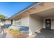 Home exterior showcasing a walkway and landscaping at 6131 E Monterey Way, Scottsdale, AZ 85251