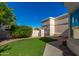 Landscaped side yard with artificial turf and gate at 16839 E Widgeon Ct, Fountain Hills, AZ 85268