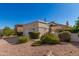 Front view of charming single story home with landscaped yard at 16839 E Widgeon Ct, Fountain Hills, AZ 85268